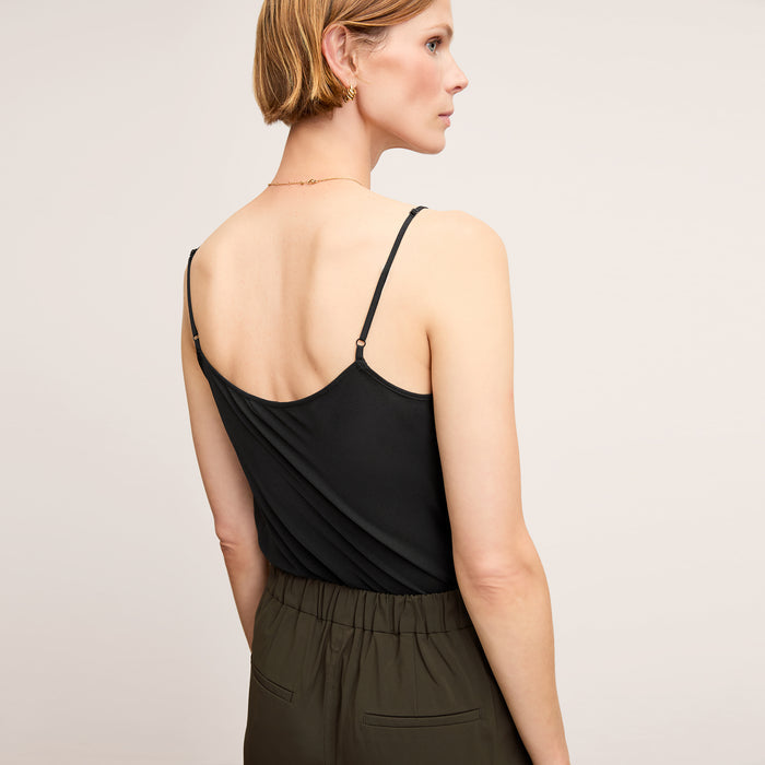 back image of a woman wearing the lisey tank in black