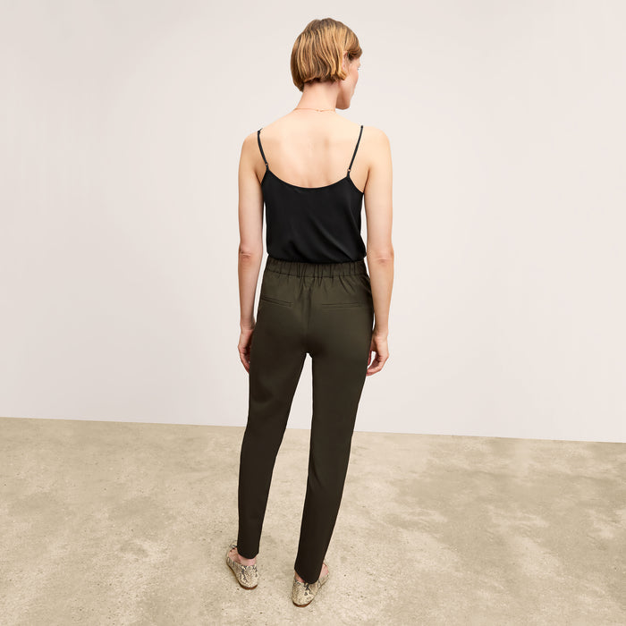 back image of a woman wearing the lisey tank in black