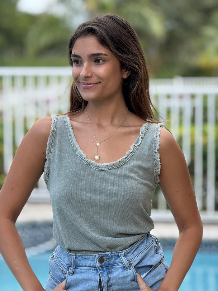 Front view of Lori Tank with raw edge neckline and sleeve. Olive color. Made in Italy