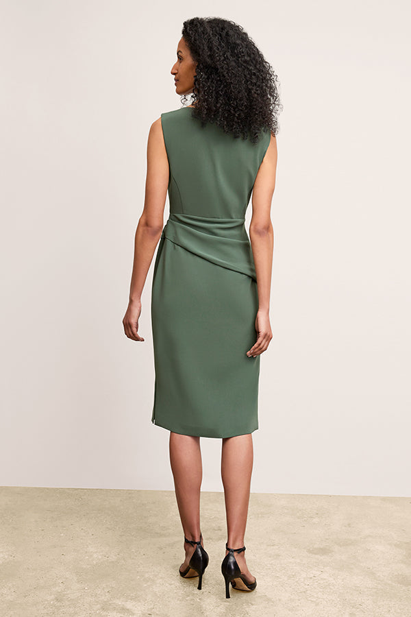 back image of a woman wearing the maisie dress in dusty pine | Exclude | Grid Hover