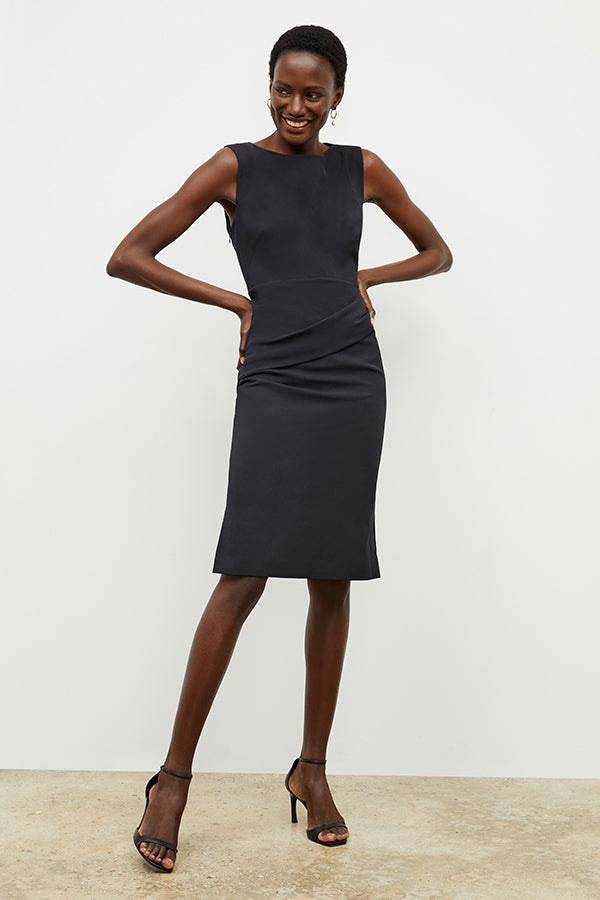 front image of a woman wearing the maisie dress in black | Exclude | Grid | Still