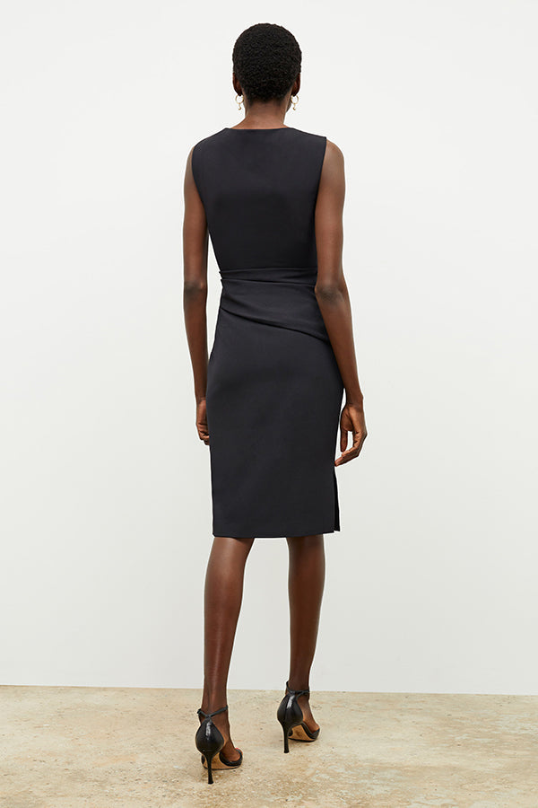 back image of a woman wearing the maisie dress in black | Exclude | Grid Hover