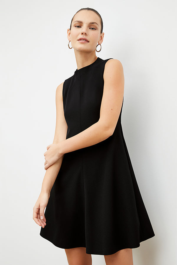 Front image of a woman in the malala dress in black | Exclude | Grid