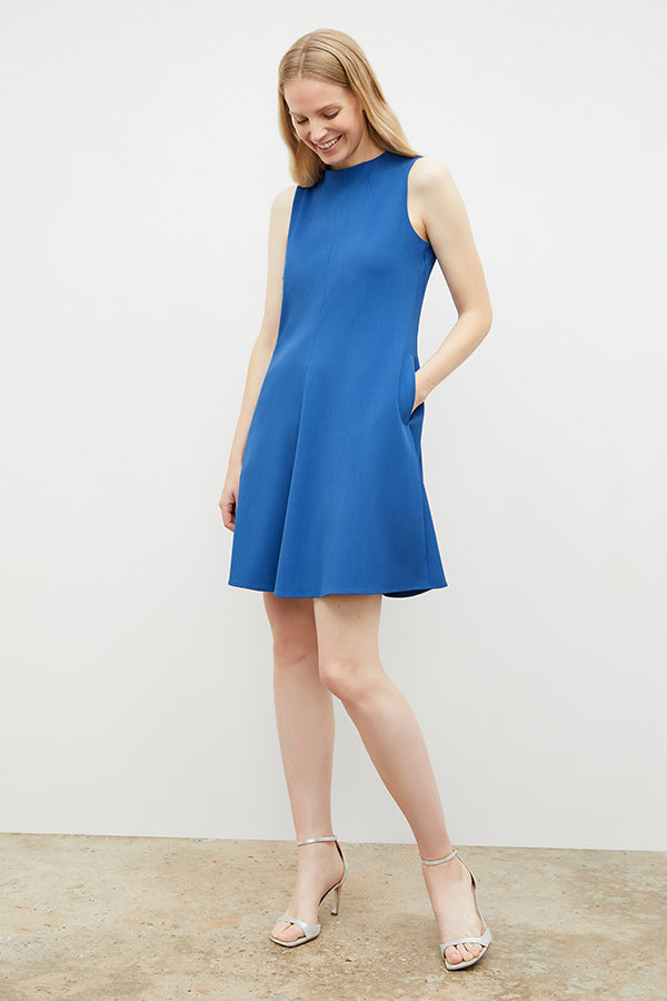 Front image of a woman in the malala dress in santorini | Exclude | Grid