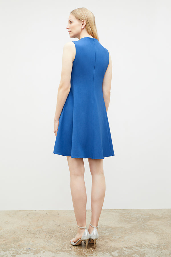 Back image of a woman in the malala dress in santorini | Exclude | Grid Hover