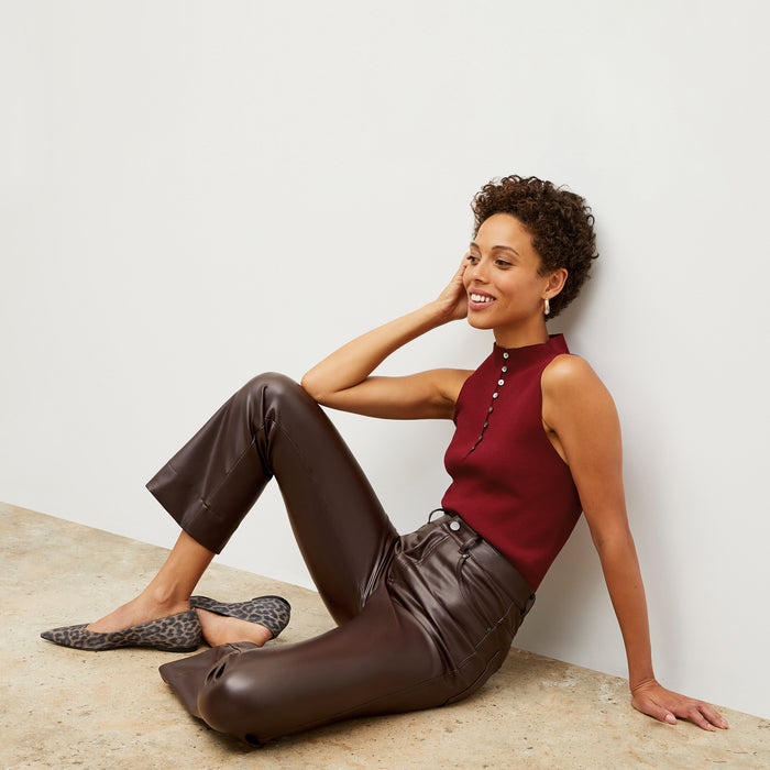 Front image of a woman wearing the malki top in maroon
