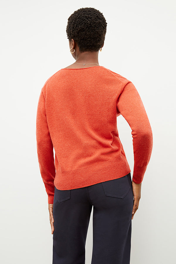 Back image of a woman wearing the martha sweater in papaya | Exclude | Grid Hover