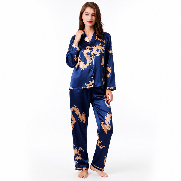 Women's royal blue matching couple pajamas with gold dragon and phoenix print, glossy long-sleeve top and full-length pants.
