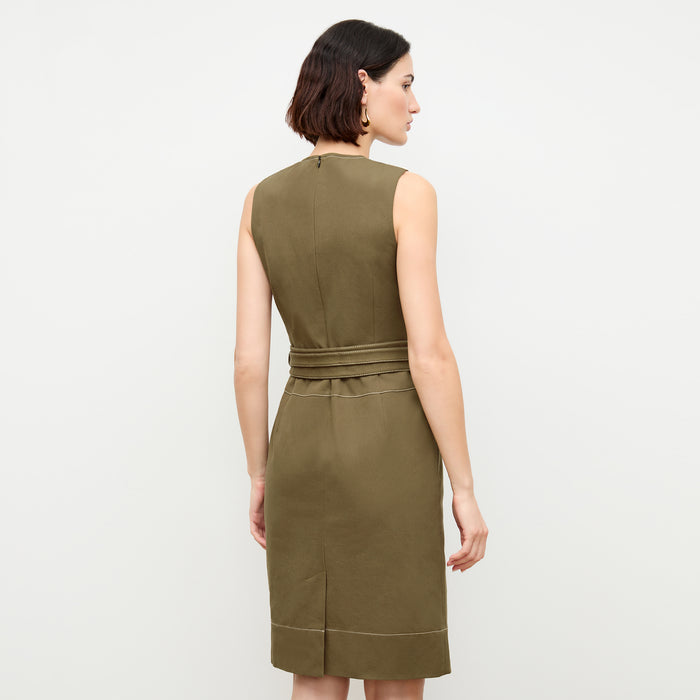 back image of a woman wearing the maude dress in oregano