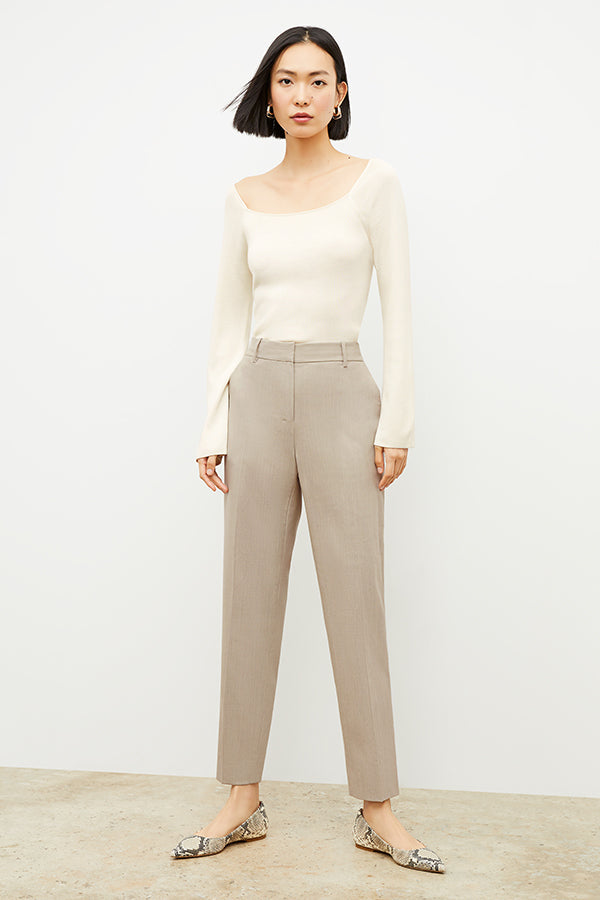 Front image of a woman wearing the Mejia Pant in Natural Melange | Exclude | Grid