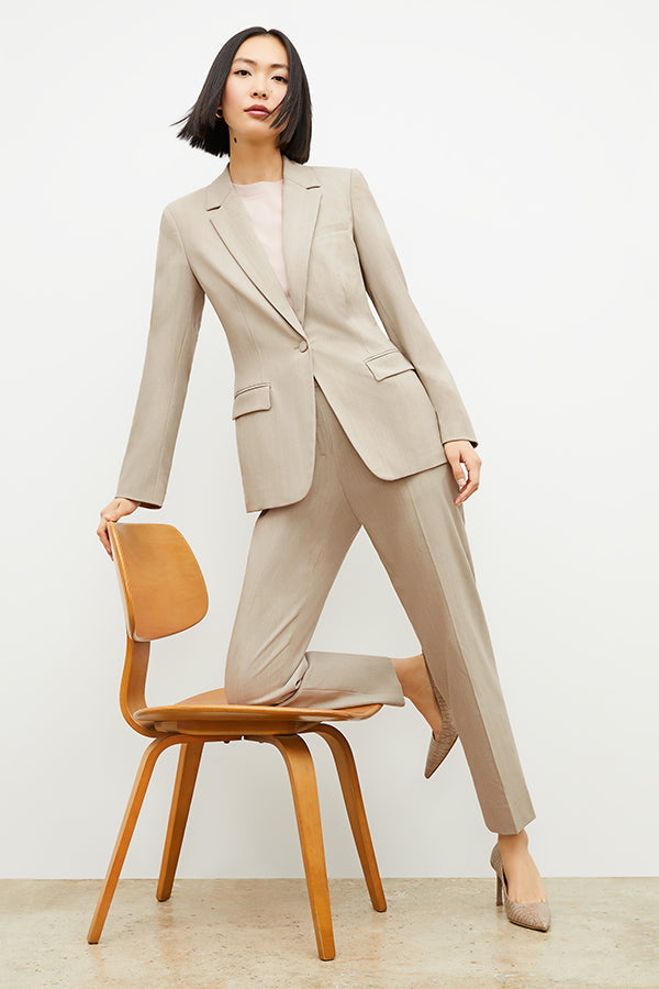 Front image of a woman wearing the Mejia Pant in Natural Melange | Exclude