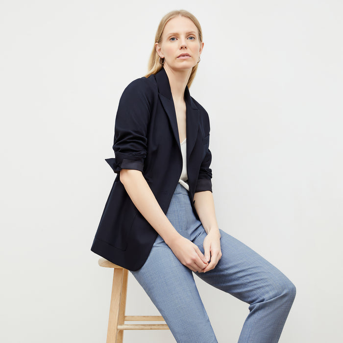 Front image of a woman wearing the mejia pant in indigo and white | Lead