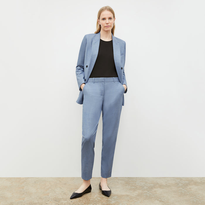 Front image of a woman wearing the mejia pant in indigo and white