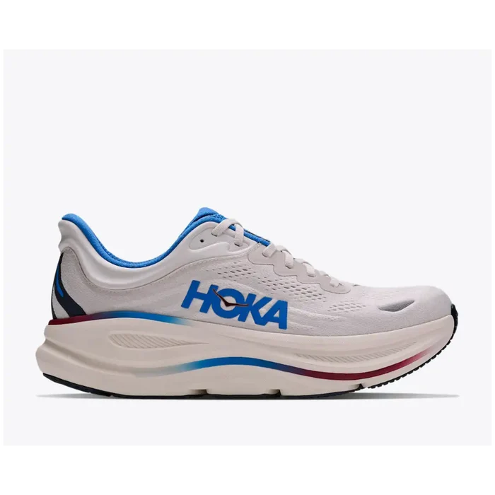 A Hoka running shoe in white with blue and red accents, shown in a side profile on a light gray background.