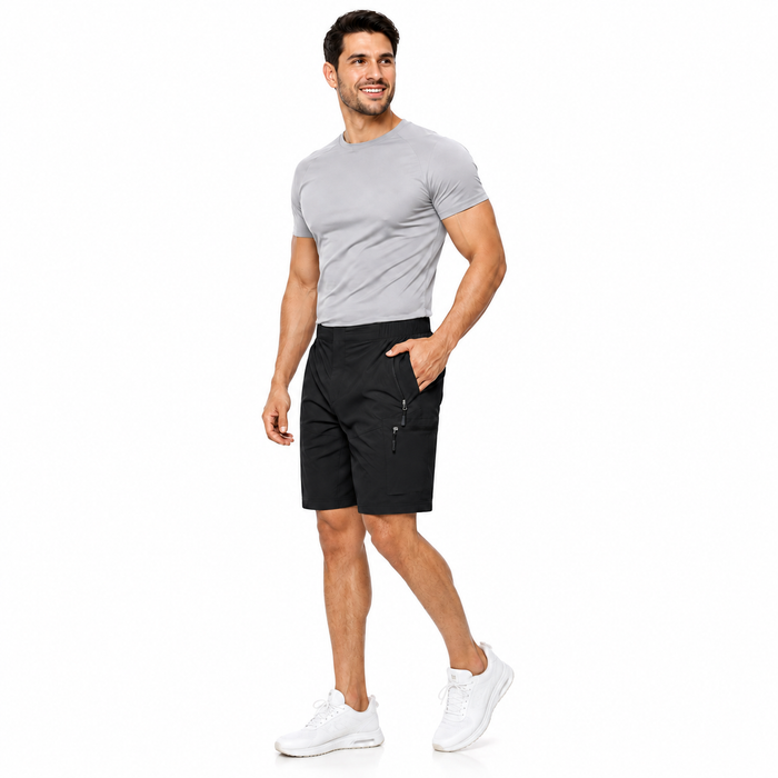 Men's black cargo shorts on male model in walking pose with utility pockets