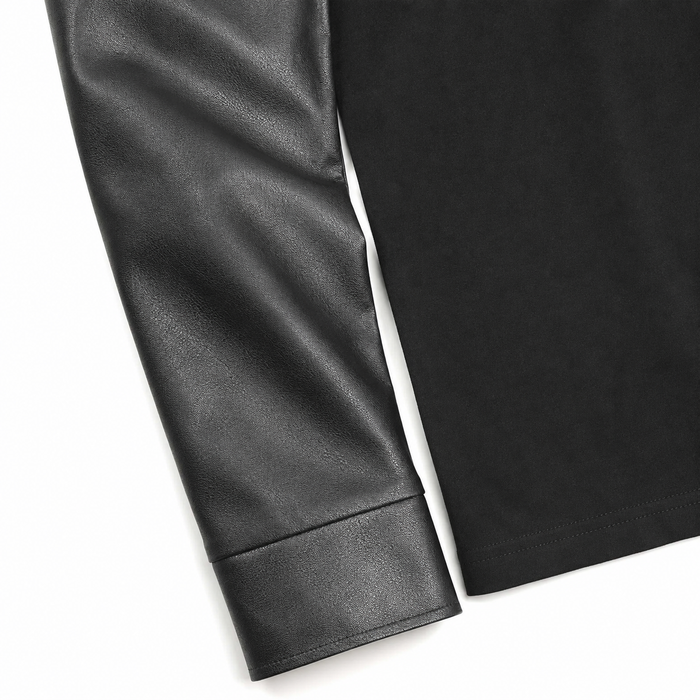 Close view of the men's black long sleeve polo cuff, sleeve surface, body fabric and lower hem stitching on white.
