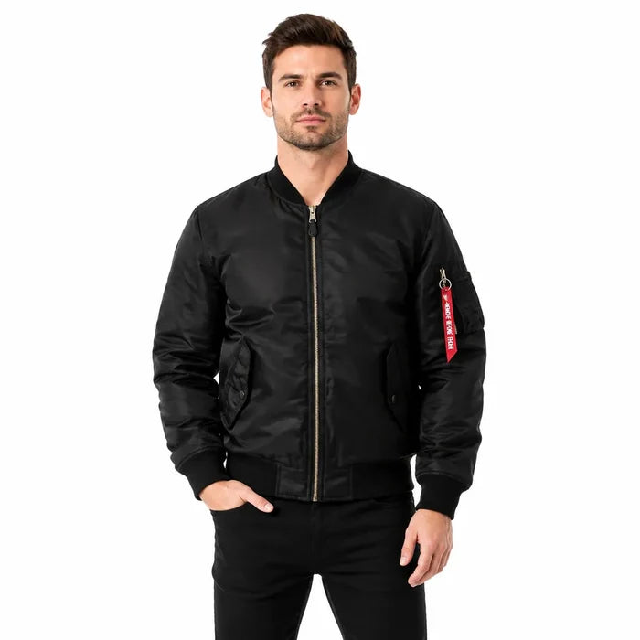 Men's MA-1 bomber jacket in Black on a male model, showing the zip front, ribbed hem and sleeve pocket on a white background.