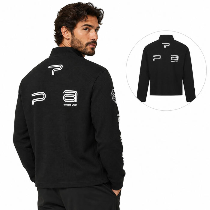 Black men's waffle knit long sleeve shirt shown from the back on a male model with printed graphic details.