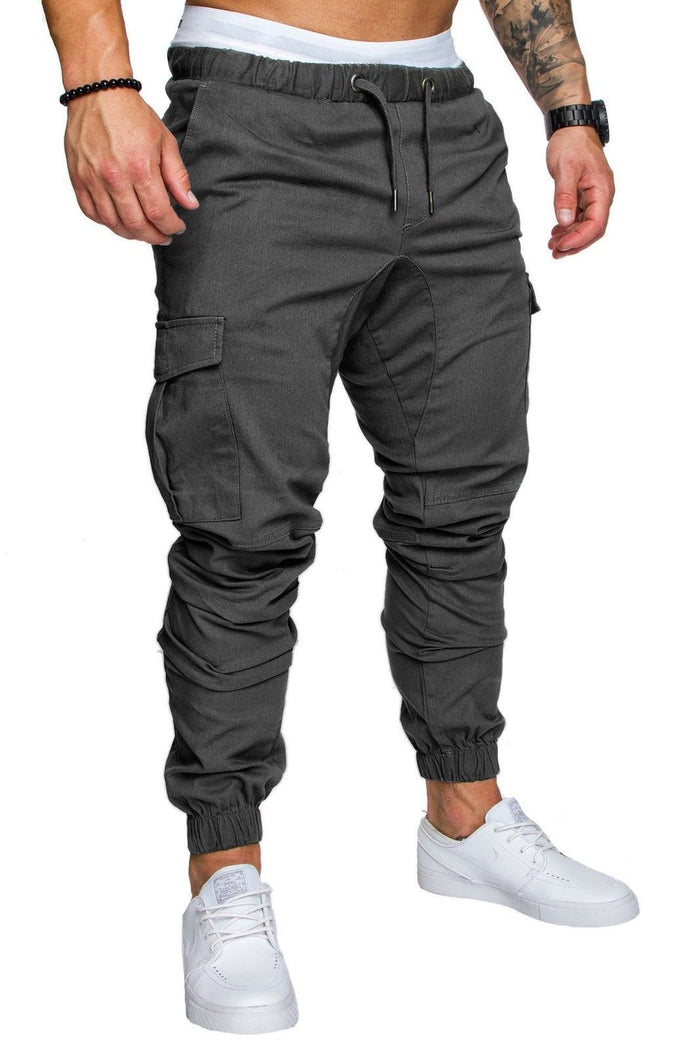 Cotton blend men's casual pants with multiple utility pockets, loose fitting shape, mid waist and solid color workwear styles