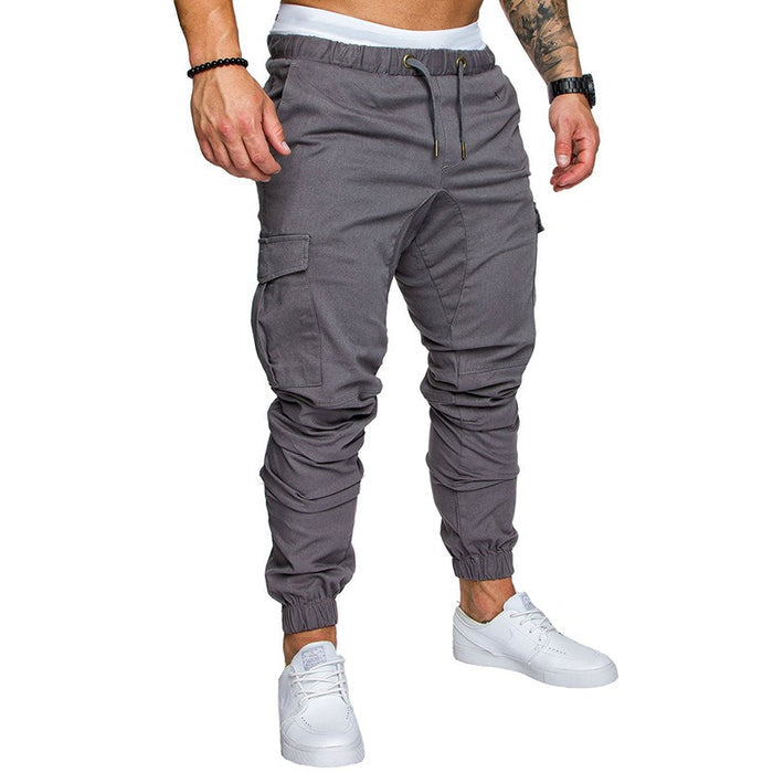 Men's utility trousers with multi-pocket details, cotton blend fabric, loose fit mid waist and lace-up closure for daily wear
