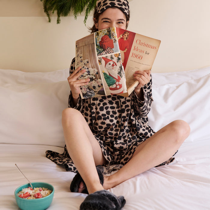 Front image of a woman wearing the Petite Plume x M.M. Long Sleeve Short Set in Sahara Print