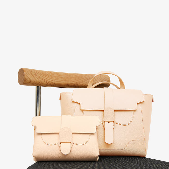 Still image of the M.M.LaFleur x SENREVE Aria Belt Bag in Chablis