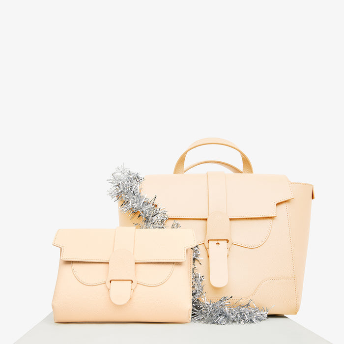 Still image of the M.M.LaFleur x SENREVE Aria Belt Bag in Chablis