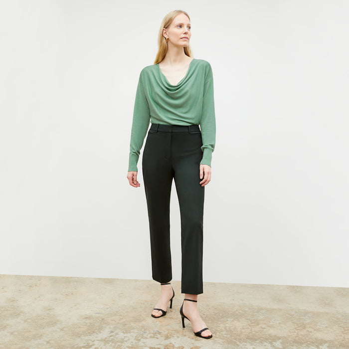 Front image of a woman wearing the monica top in spring green | Lead