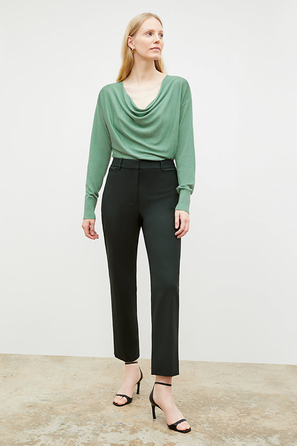 Front image of a woman wearing the monica top in spring green | Exclude | Grid