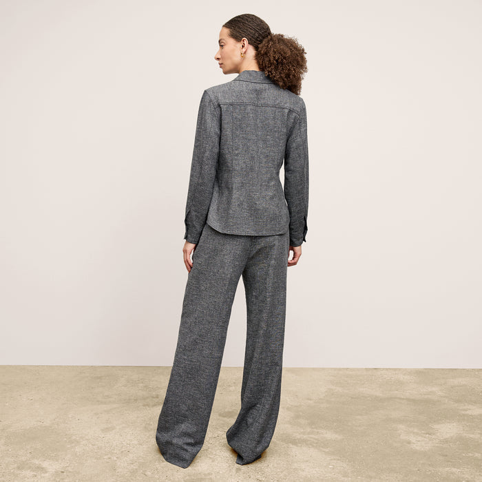 back image of a woman wearing the natalia jacket in black/white