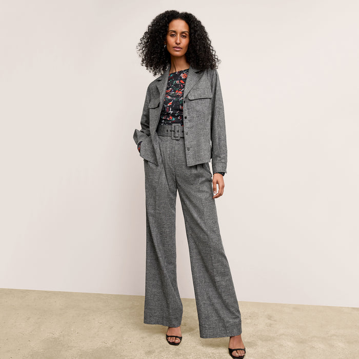front image of a woman wearing the natalia jacket in black/white