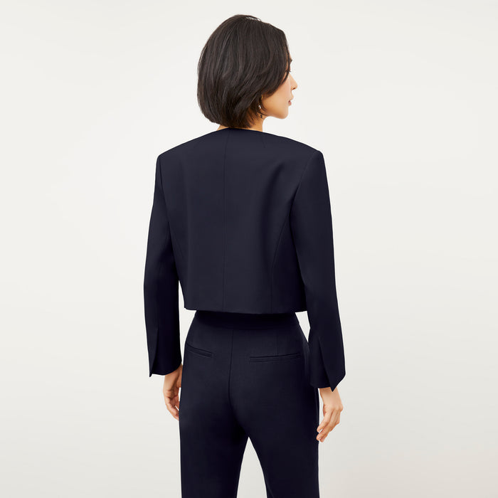 Back image of a woman wearing the Neale blazer in Galaxy Blue