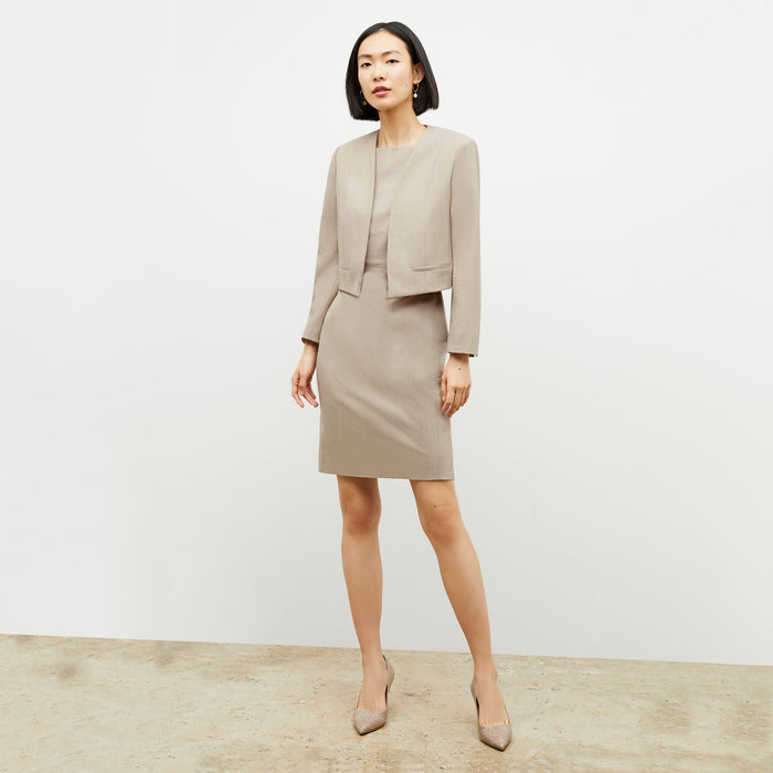 Front image of a woman wearing the Neale Jacket in Natural Melange