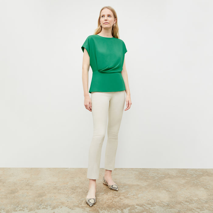 Front image of a woman in the nejvi top in clover | Lead