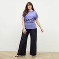 Front image of a woman wearing the Nejvi Top in Iris | Lead