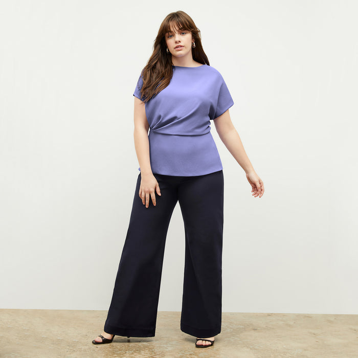 Front image of a woman wearing the Nejvi Top in Iris | Lead