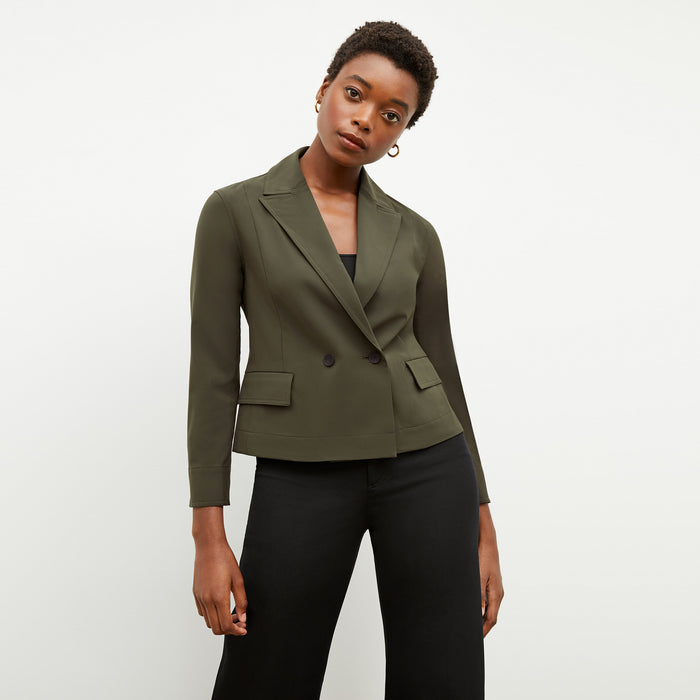 Front image of a woman wearing the nia jacket in olive | Lead