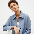 Front image of a woman wearing the nicky jacket in indigo and white | Lead