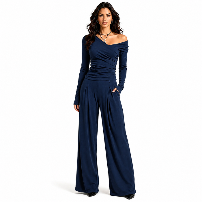 Women's navy off shoulder wide leg pants set with ruched long sleeve top and coordinated full length trousers on white.