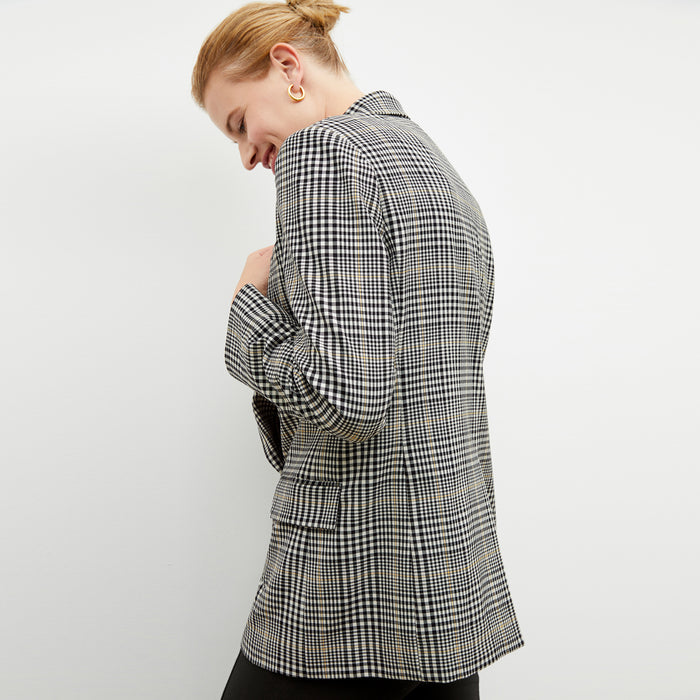 Back image of a woman wearing the o'hara blazer in plaid sharkskin