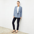 Front image of a woman wearing the ohara blazer in indigo and white | Lead