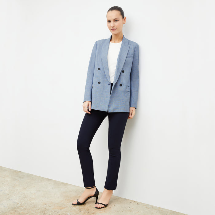 Front image of a woman wearing the ohara blazer in indigo and white | Lead