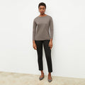 Front image of a woman wearing the owen t shirt in pebble | Lead