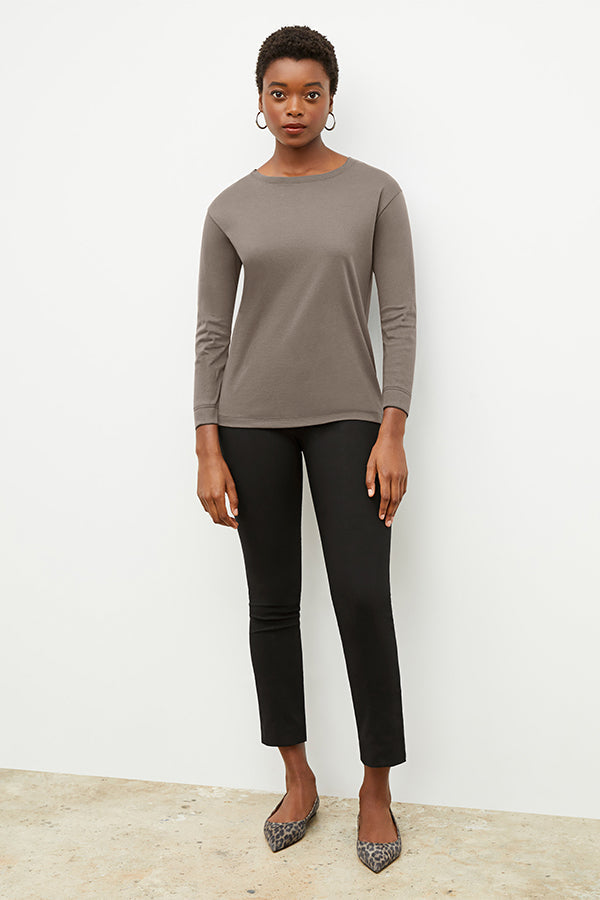 Front image of a woman wearing the owen t shirt in pebble | Exclude | Grid Hover