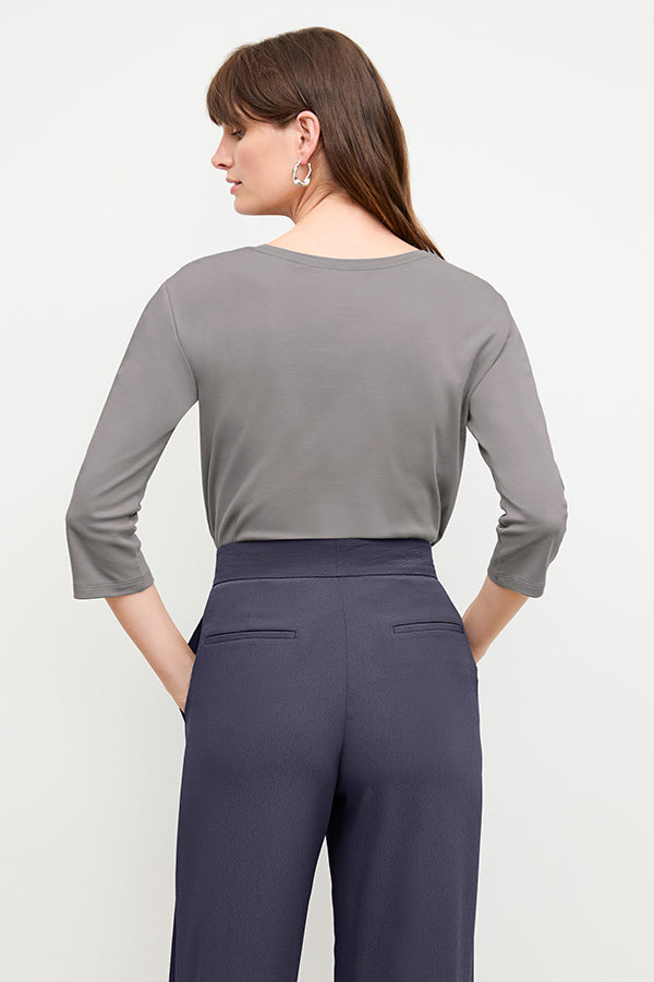 front image of a woman wearing the owen t-shirt in thistle | Exclude