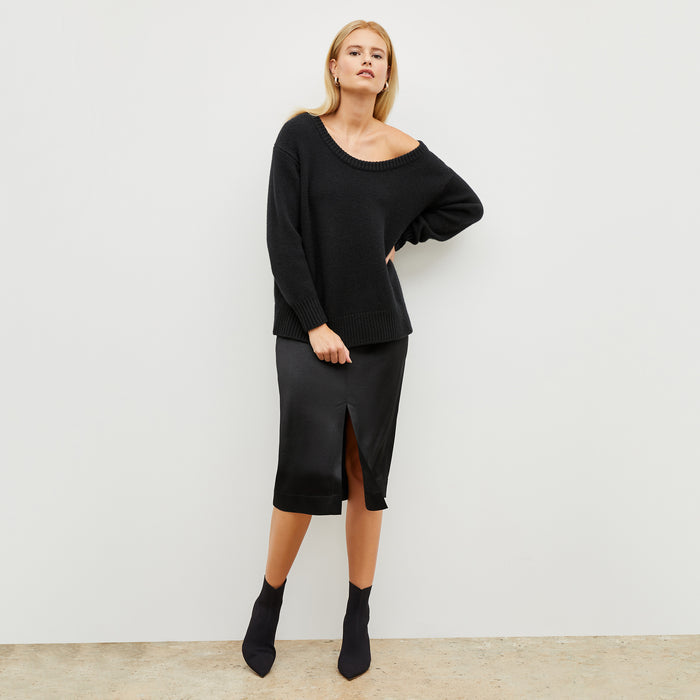 Image of a woman wearing the Penny Skirt in Black