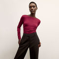 front image of a woman wearing the percy top in grenache | Lead