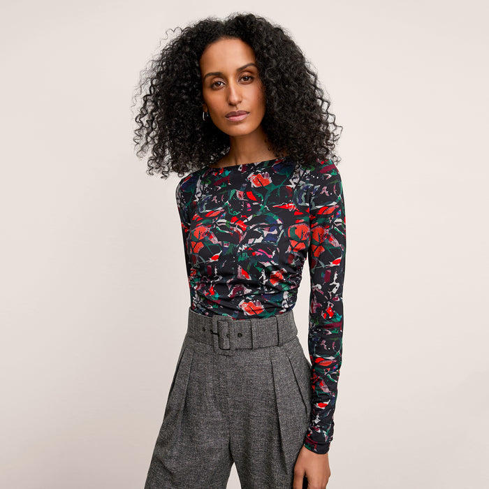front image of a woman wearing the percy top in splatter pop | Lead