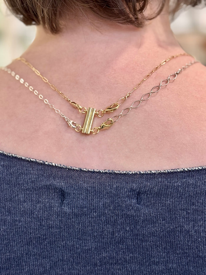 View from the back Double Layering Clasp in gold filled on model