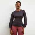 Front image of a woman wearing the rashida top in navy multi
